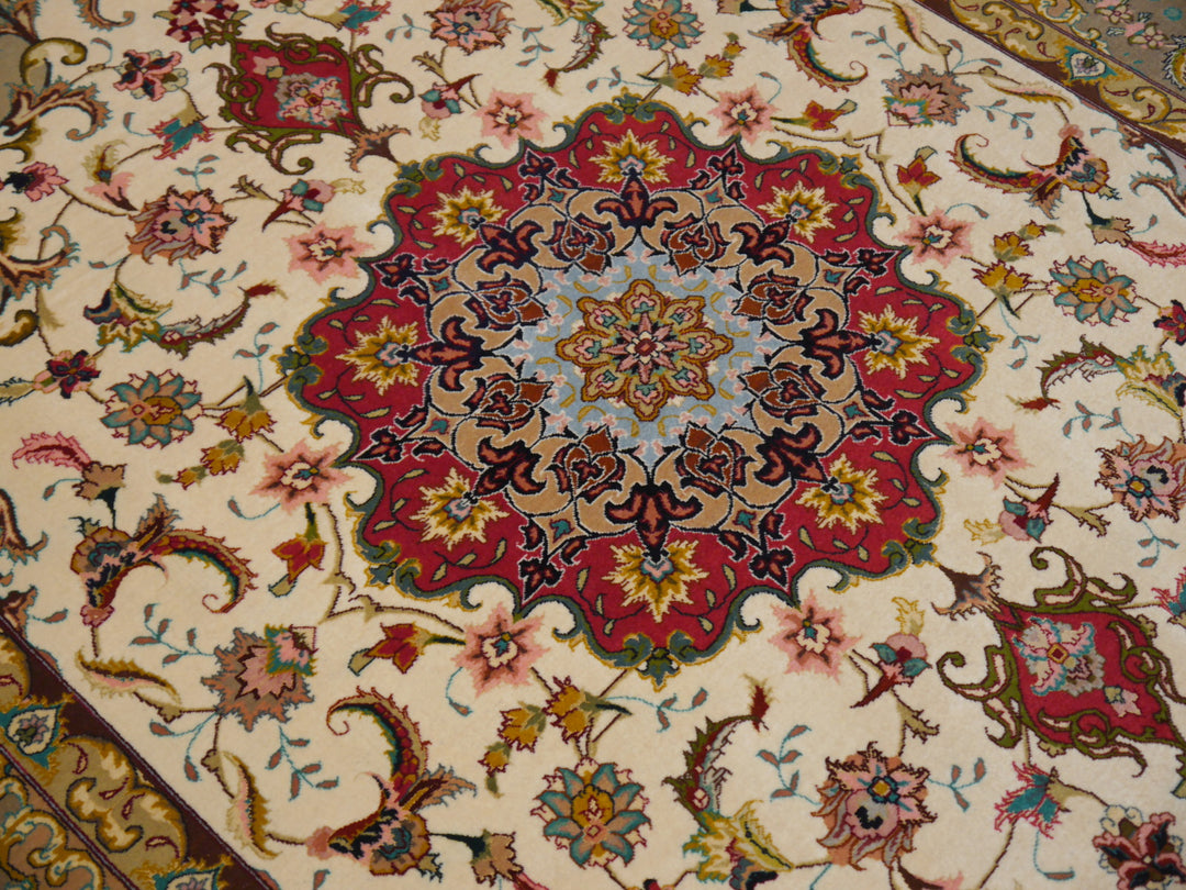 Luxurious Tabriz oriental rug in a living room setting, harmonious beige and green tones, elegant accent for high-end interiors. Field and Medaillon