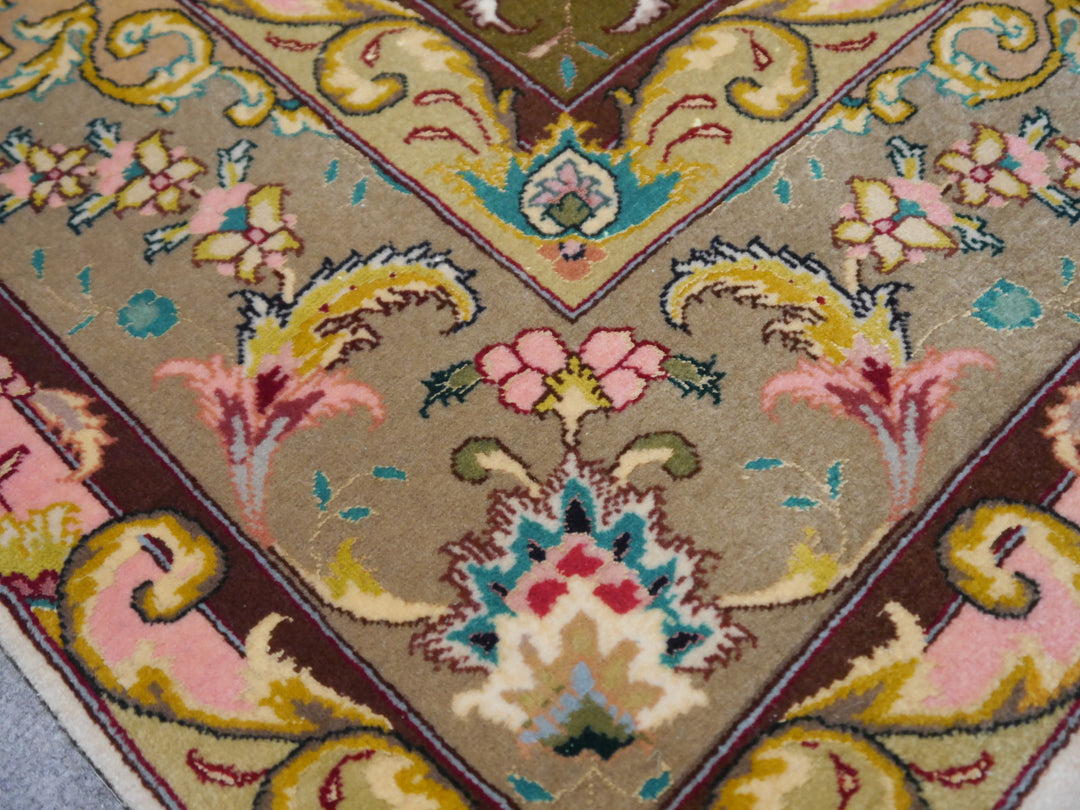 Tabriz Persian Rug Hand knotted 
Pile: Kurkwool (very fine lamb wool) and natural mulberry silk
Knot density: 50 raj / 324 kpsi / 490.000 knots per m²
Condition: New, unused
Age: 0 - 10 years
Collection: Traditional oriental rugs
Design: Medaillon
Size: Medium size accent rugs circa 7 x 5 ft 
Colors: Beige, Green, Red
Condition: Perfect
Rug Pad: Recommended
Care: Vaccum cleaning, proffesional rug washing if needed, no drycleaning or chemical cleaning.
Use: Goes well in Bedroom, Entry, Office, Livingroom