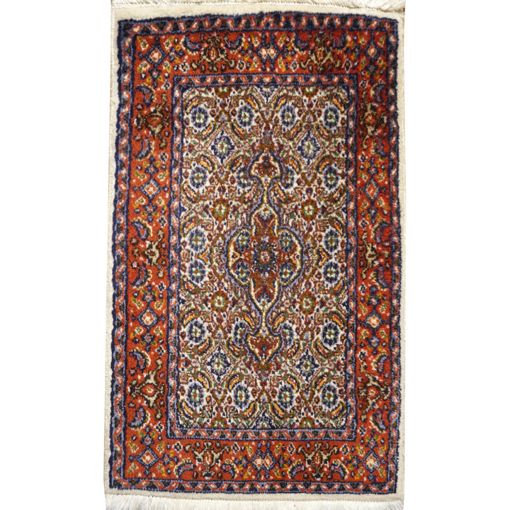 Moud Birjand rug 60 × 40 cm, ivory Mahi field with rust red border, viewed from above | 13377