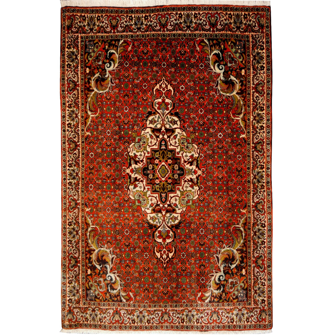 Perserteppich Bidjar Tekab, 170 × 110 cm, Mahi Herati auf Rostrot mit Elfenbein-Medaillon und dunklen Eckzwickeln mit großen Rankenvoluten — Gesamtansicht