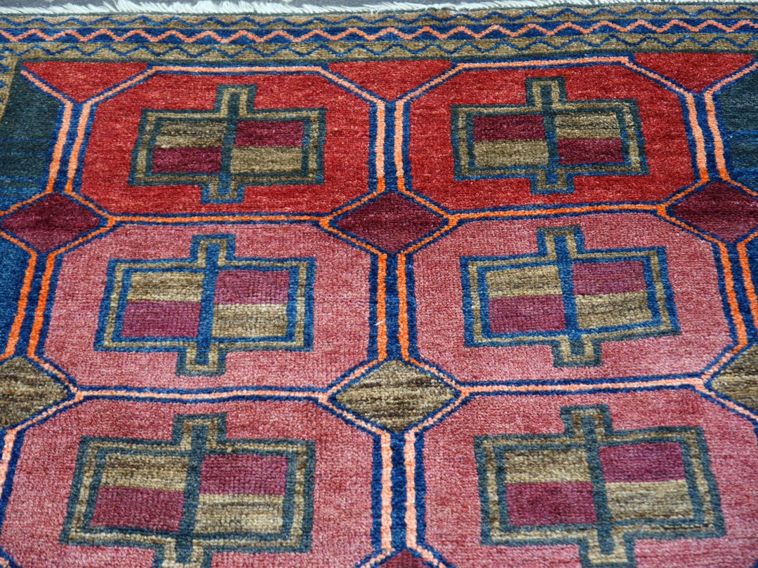 Authentic vintage Persian Luri rug with geometric tribal patterns in brick red and indigo blue, 197 x 132 cm. Detail 7