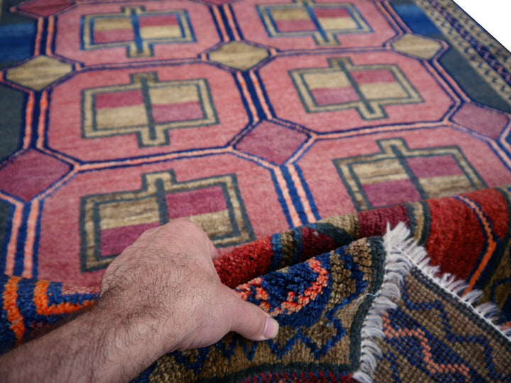Authentic vintage Persian Luri rug with geometric tribal patterns in brick red and indigo blue, 197 x 132 cm. Total 12
