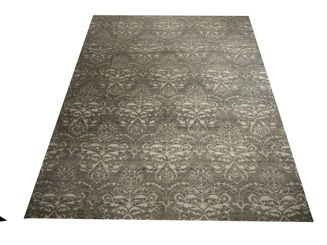 Crowned palmette of the Mystique damask in ivory against the grey wool ground | 15745