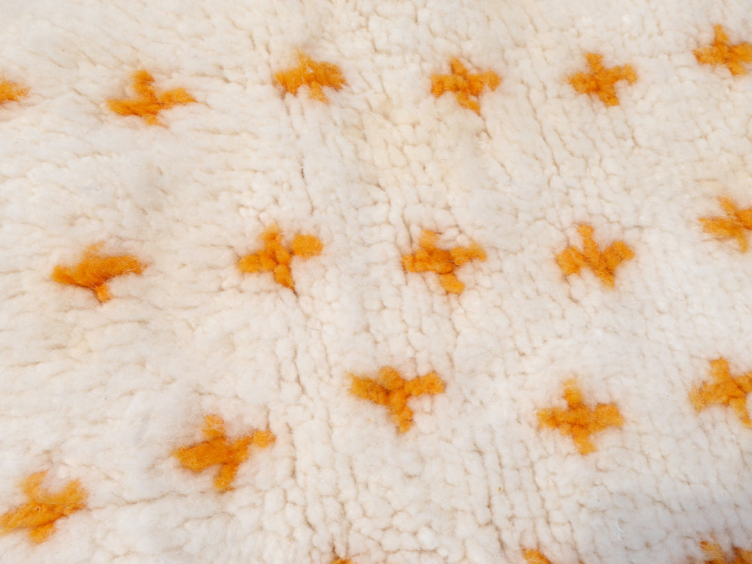 Sabah Berber rug — pattern detail in beige and orange