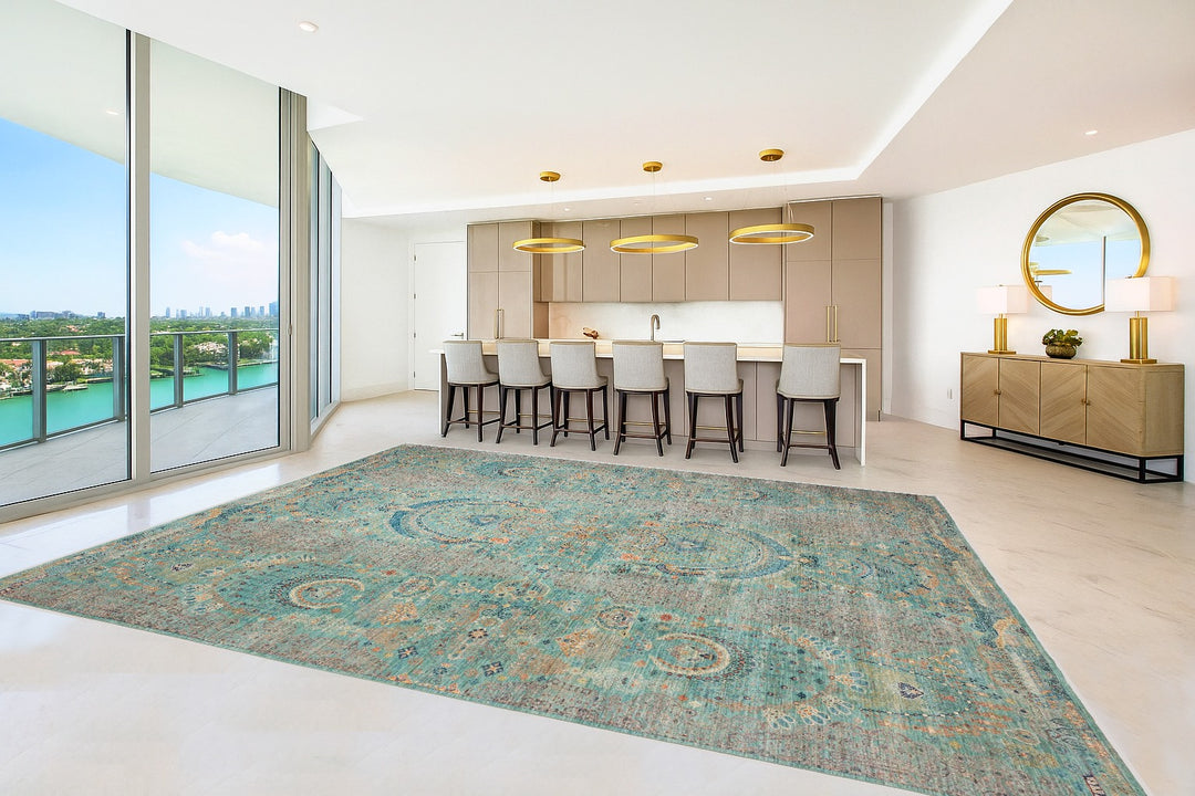 Karakul rug 269 x 366 cm, aqua ground with beaded oval medallions in coral, saffron and indigo, hand-knotted in Afghanistan