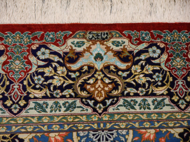 Qum silk rug detail — floral field, Djoharian #12233