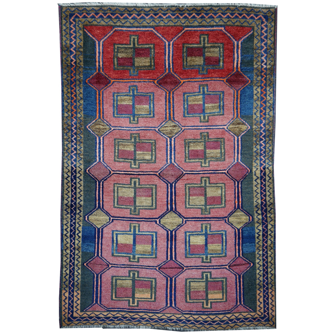 Authentic vintage Persian Luri rug with geometric tribal patterns in brick red and indigo blue, 197 x 132 cm.